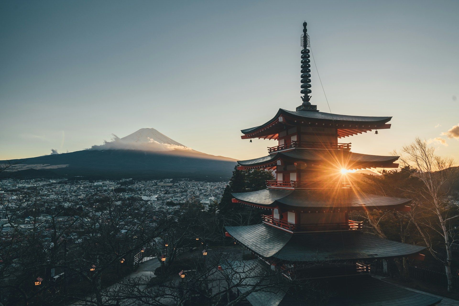 A screenshot of a beautiful Japanese temple with Mount Fuji in the background